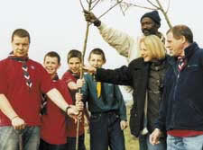 Plantring a tree on behalf of the Scouts Ghambia Link